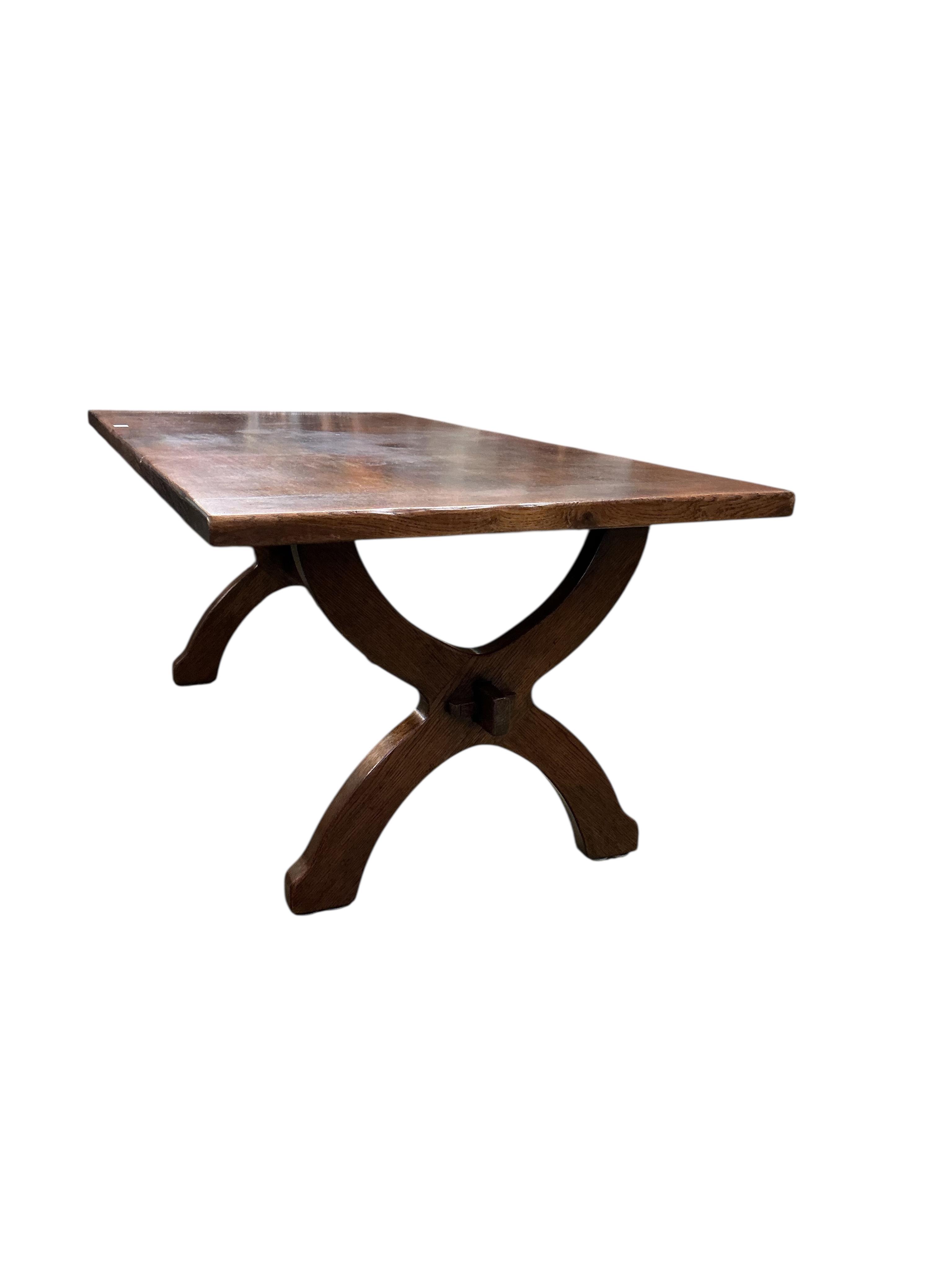 An 18th century style rectangular oak tavern or refectory dining table, width 197cm, depth 95cm, height 76cm